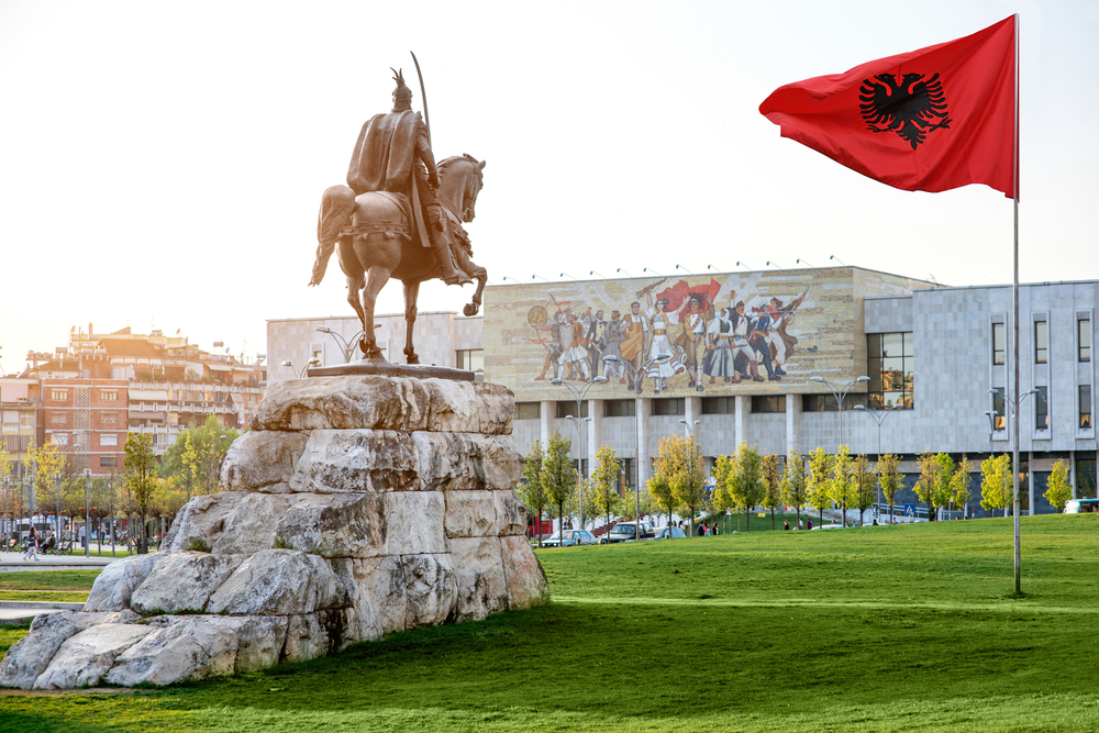 Skanderbeg square, Albanianflag, monument and national museum in the center of Tirana